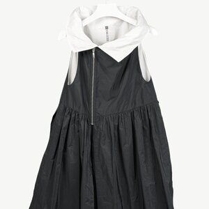 XD Xenia Cini Zip White Asymmetrical Collar Pleat Skirt Black Poly Over-Dress